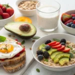 Healthy low salt breakfast spread featuring avocado toast, oatmeal with fresh toppings, and a low-sodium yogurt parfait.